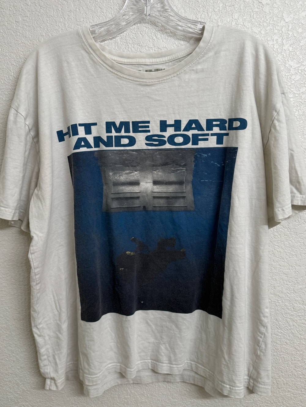 Official Billie Eilish Hit Me Hard and Soft album merchandise graphic t-shirt.